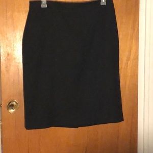 Black skirt, lined, size 16.